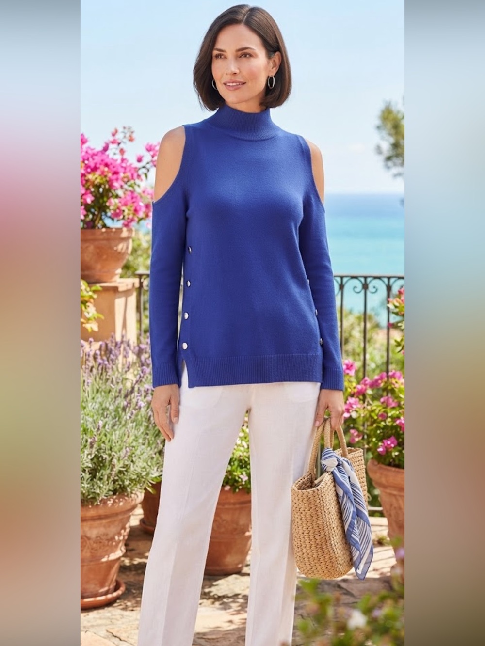 Chico’s royal blue turtleneck cold shoulder sweater